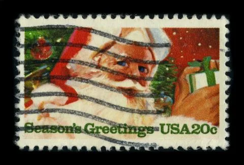 Old postage stamp on a black background. Foto stock