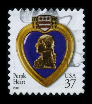 Old postage stamp on a black background. Foto stock