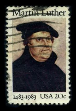 Old postage stamp on a black background. 스톡 사진