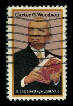 Old postage stamp on a black background. 스톡 사진