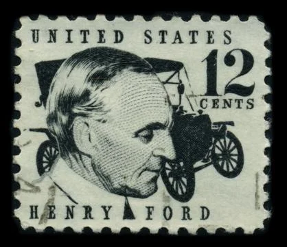 Old postage stamp on a black background. 스톡 사진