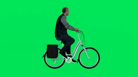 An old postman with a bicycle from a side angle Video stock 246731510