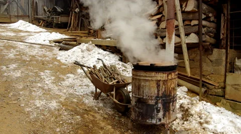 Old pot for cooking over a campfire Stock Footage 34249463