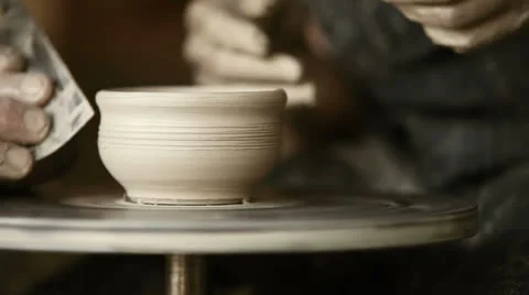 Old Potter works in workshop Stockbeeldmateriaal 25333459