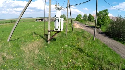Old power transformer. Flying over the old power transformer Stock Footage 63041048