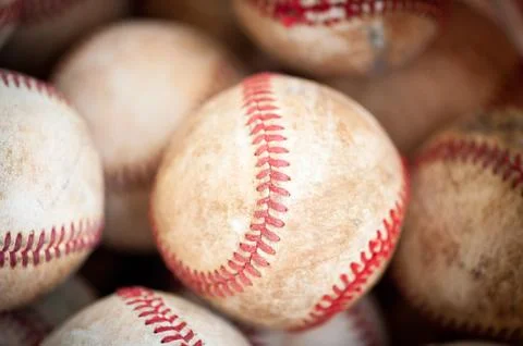 Old practice baseballs 库存照片