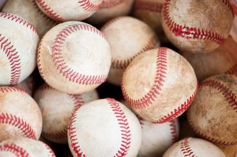 Old practice baseballs 库存照片