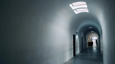 An old prison corridor. 4K Stock Footage 325987268