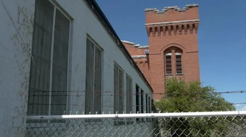 Old prison guard tower and barbed wire Stock Footage 8836312