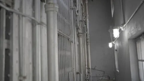 Old prison hall with industrial pipes Stock Footage 345762585
