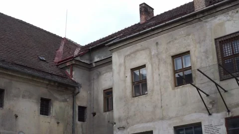 Old prison walls with bars Stock Footage 246774337