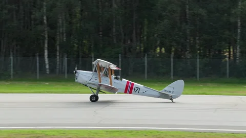 Old propeller airplane tiger moth bumpy landing notodden september 2023 Video stock 255012749