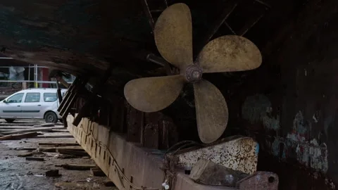 Old propeller on the bottom of the vessel ship. Dry dock. Maintenance and repair Stock Footage 268422569