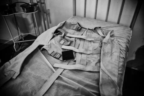 Old psychiatric straitjacket Stock Photos