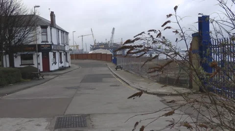 Old pub outside abandoned ship yard 動画素材 1090516