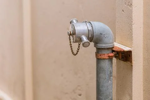 Old public fire hydrant pipe in poor country Foto stock