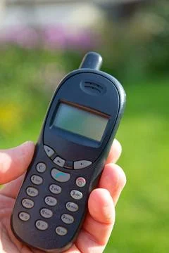 Old push-button cell phone Stock Photos