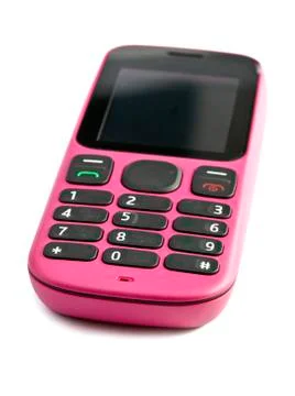 Old push-button pink telephone Stock Photos