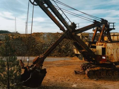 Old quarry crane. harmful methods of obtaining stone. environmental danger so Stock Photos