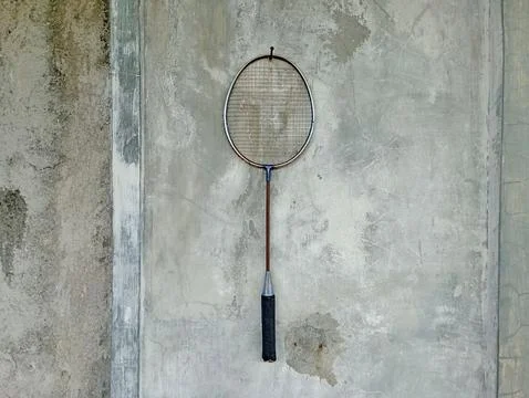 Old racket hanging on the wall Stock Photos