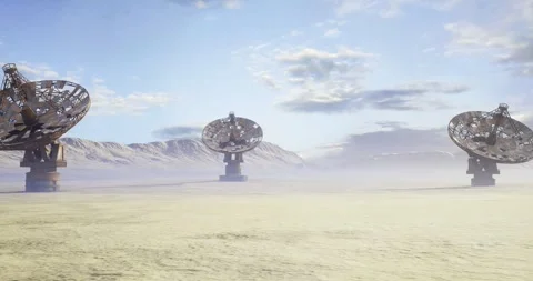 Old radar statues, Rusty radar structures rest on empty plain Stock Footage 333557991