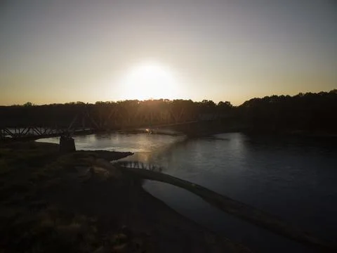 Old Rail Bridge over the River Sunset Stock Photos