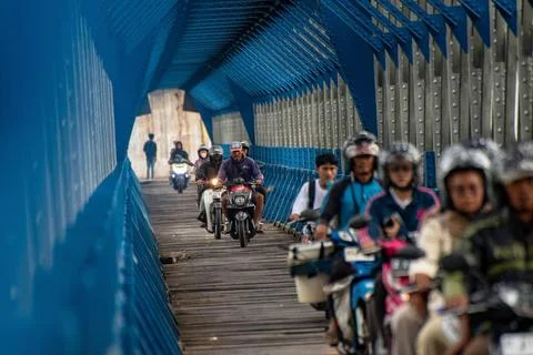  OLD RAILROAD BRIDGE IN WEST JAVA Motorcyclists cross the Cirahong bridge ... Photos