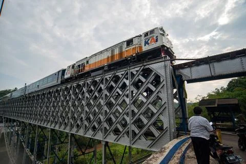  OLD RAILROAD BRIDGE IN WEST JAVA A train passes the Cirahong bridge in Ci... Photos