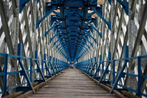 OLD RAILROAD BRIDGE IN WEST JAVA Motorcyclists cross the Cirahong bridge ... Photos