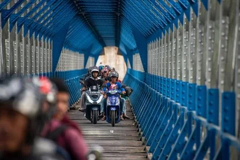  OLD RAILROAD BRIDGE IN WEST JAVA Motorcyclists cross the Cirahong bridge ... Photos