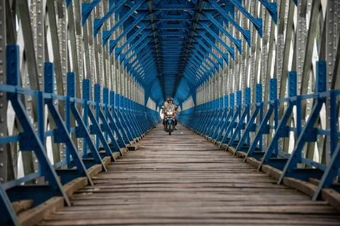  OLD RAILROAD BRIDGE IN WEST JAVA Motorcyclists cross the Cirahong bridge ... Photos