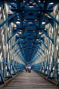  OLD RAILROAD BRIDGE IN WEST JAVA Motorcyclists cross the Cirahong bridge ... Photos