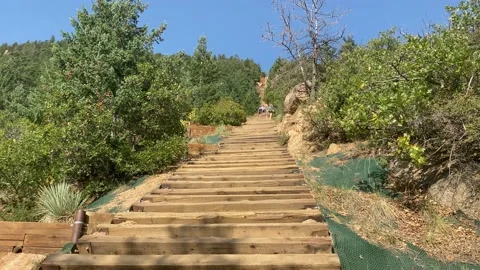 The old railroad ties that make up the Manitou Incline hike in Colorado Stock Footage 140368642