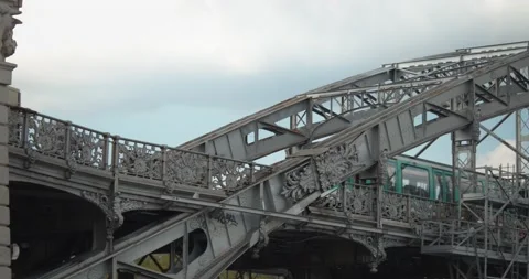 Old railway bridge. A train passes on a bow bridge with suspended deck Stock Footage 196674778