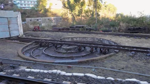Old railway turntable track with circular pit and rusted rails vintage train Stock Footage 333538392
