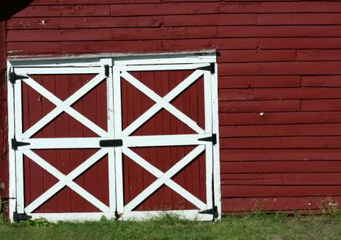 Old red bard doors Stock Photos