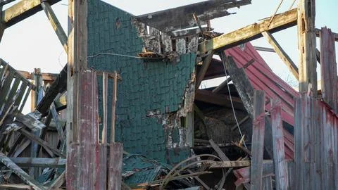 Old Red Barn Fallen Due To Climate Change Stock Photos