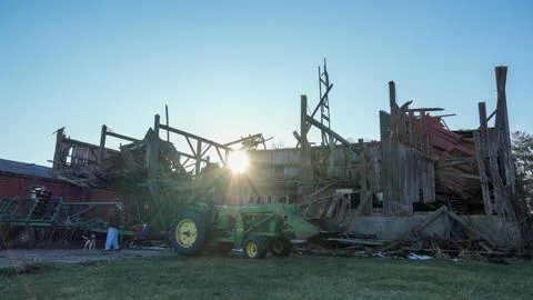 Old Red Barn Fallen Due To Climate Change Stock Photos