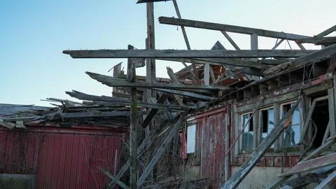 Old Red Barn Fallen Due To Climate Change Stock Photos