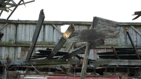 Old Red Barn Fallen Due To Climate Change Stock Photos