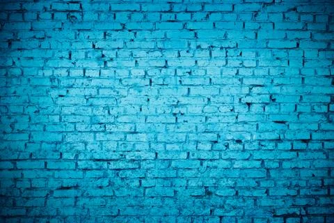 Old red brick Brick wall painted with deep blue paint Stock Photos