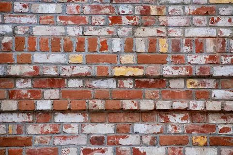 An old red brick wall. ancient building Stock Photos