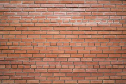 Old red brick wall background, wide angle view . Construction site concept Stock Photos