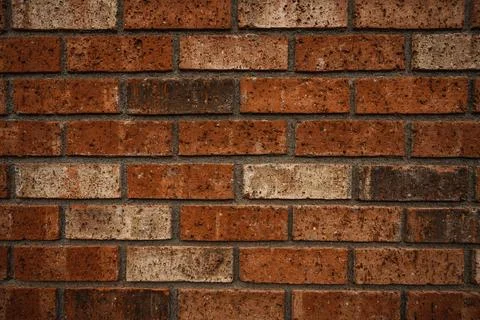 Old red brick wall background. Texture of red stone blocks Stock Photos