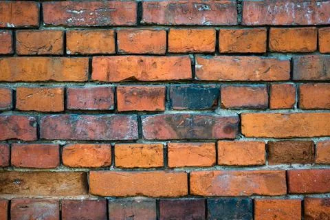 The old red brick wall, built in the 19th century Stock Photos