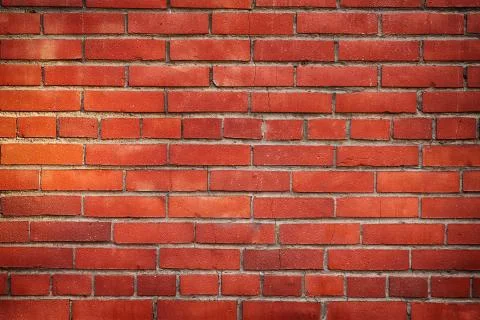 Old red brick wall close up. Texture and background Stock-Fotos