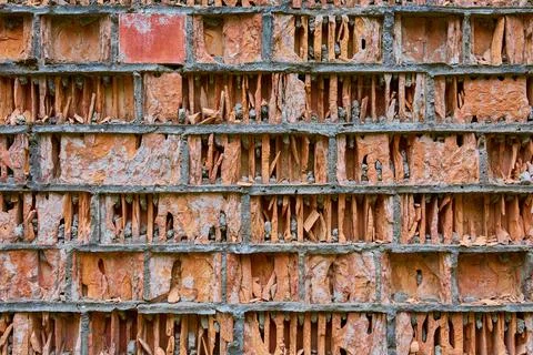 Old red brick wall collapses by weathering, erosion eolation Stock Photos