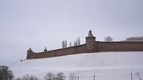 The old red brick wall of the Kremlin in Nizhny Novgorod background of a winter Stock Footage 305445400
