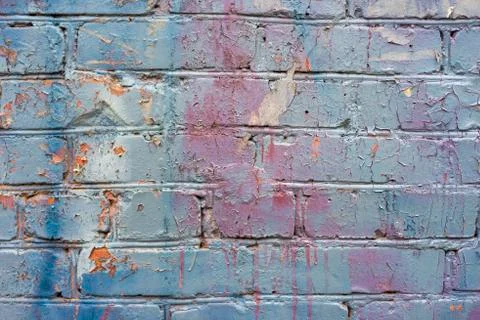 Old red brick wall, masonry close-up texture, brick painted blue Stock Photos