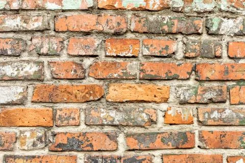Old red brick wall, rustic texture, design background. Stock Photos